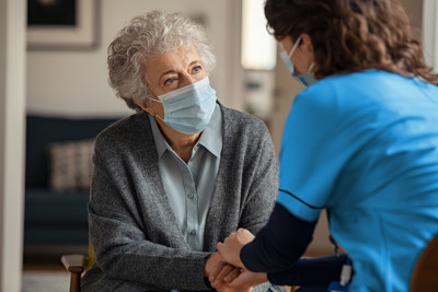 Nurse comforting patient