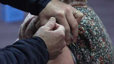 Patient getting vaccination in arm